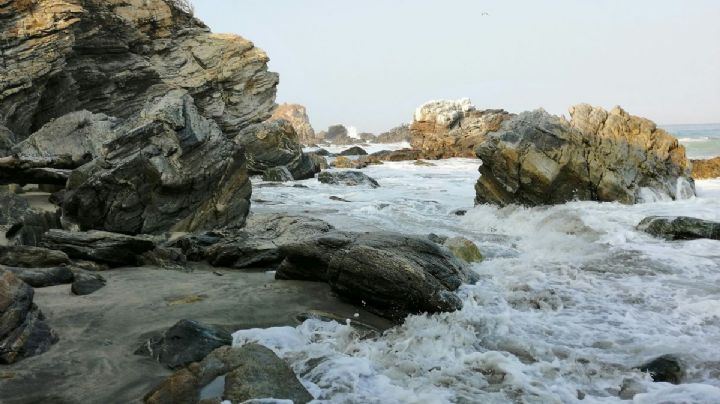 ¡Frente al mar! El rincón oculto de Puerto Escondido con un muro de escalar para aventuras únicas
